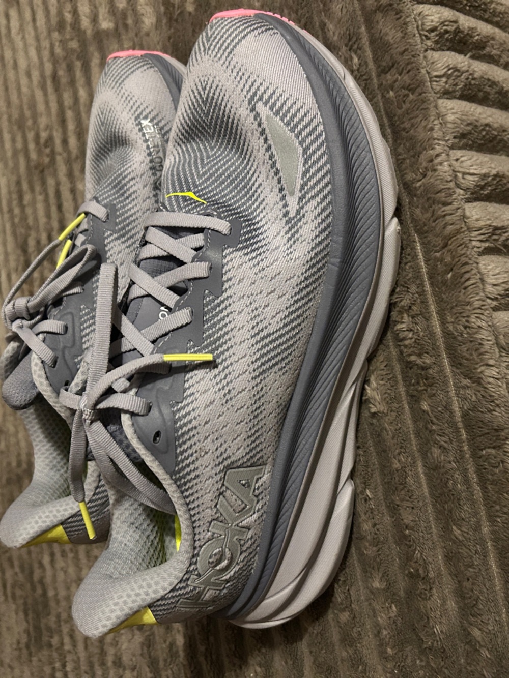 Hoka Gray Athletic Running Shoes with Yellow and Pink Accents